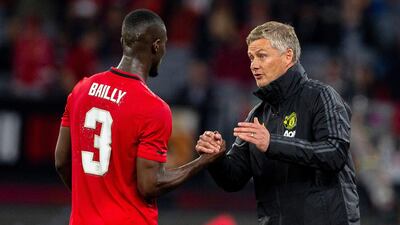 Solskjaer with Eric Bailly. EPA