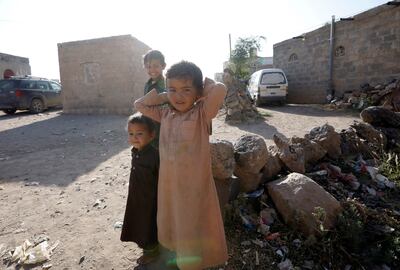 Yemeni children stand outside their family home in Sanaa. A war in the country has created what the UN has described as the world's worst humanitarian crisis. EPA
