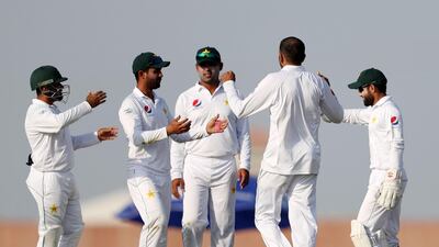 Pakistan's Mohammad Irfan takes the wicket of England's Danny Briggs.