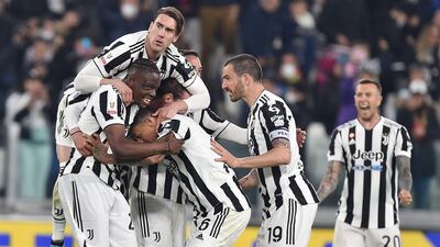 Juventus players celebrate after Federico Bernardeschi put his team 1-0 up. EPA