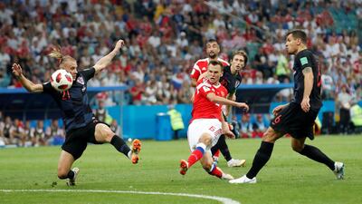 Russia's Denis Cheryshev scores their first goal. Maxim Shemetov/Reuters