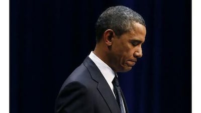 The US president Barack Obama pauses during the event held to remember and support the victims of the mass shooting in Tucson, Arizona. A reader praises his speech as measured, thoughtful and restrained. Jim Young/Reuters