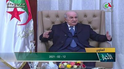 A video grab taken from footage broadcast by Algeria's Canal Algerie 2 on February 12, 2021, shows President Abdelmadjid Tebboune meeting government officials after his return to Algiers after a one-month stay in Germany for surgery following post-Covid-19 complications. AFP