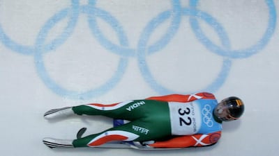 India's Shiva Keshavan speeds down the luge track during a training run at the Turin 2006 Olympic Winter Games. Keshavan is clear to compete at next year's Winter Games in Sochi after the IOC lifted India's ban. Johannes Simon / AFP