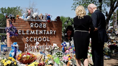 President Joe Biden and his wife Jill Biden paid their respects at the Robb Elementary School memorial. A gunman killed 19 children and two teachers in the deadliest US school shooting in almost a decade, in Uvalde, Texas, in May. Reuters