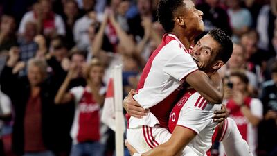 Dusan Tadic, right, arrived at Ajax over the summer at a cost of €12 million as the Dutch club bid to restore their place among the European elite. EPA