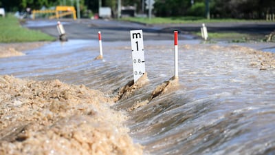 Flood water on a road in Dalby, Queensland. EPA