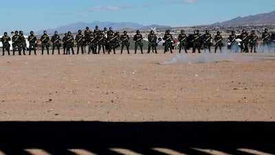 US Border Patrol agents conduct a training exercise in the Anapra area, in front of the wall that divides Sunland Park, New Mexico, US. AFP