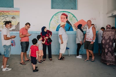 Voters wait at a polling station in downtown Tunis to cast their ballots in the referenendum. Erin Clare Brown/ The National