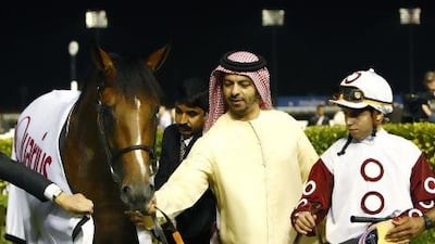 UAE-based trainer Saeed bin Suroor, centre, is one of the local trainers who has picked up wins this season.