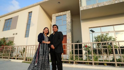 Chandra and Sujatha Dake bought their home after property prices dropped during the pandemic. Chris Whiteoak / The National