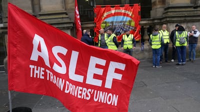 Members of the train drivers' union Aslef on the picket line outside Newcastle station on Wednesday. PA