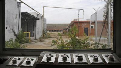 Buttons that used to open and close gates at the abandoned Central State Farm prison in Sugar Land, Texas. The unit was closed down three years ago. Pat Sullivan / AP Photo
