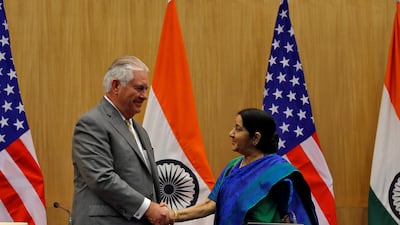 US secretary of state Rex Tillerson and Indian foreign minister Sushma Swaraj shake their hands after attending a media briefing in New Delhi on October 25, 2017. Altaf Hussain / Reuters