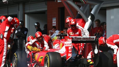 Sebastian Vettel makes a pit stop during Belgian Grand Prix. Mark Thompson / Getty Images