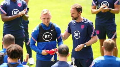 England manager Gareth Southgate gives the national cap to Jarrod Bowen. PA