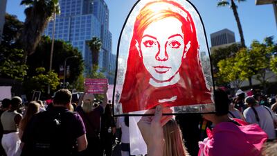 A portrait of Britney Spears is held by a supporter outside a November 2021 hearing on her conservatorship, in Los Angeles. AP