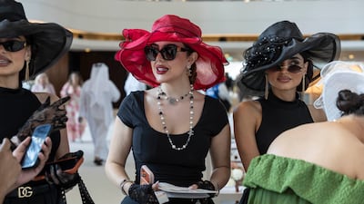 The 30th Dubai World Cup held at Meydan in Dubai. Sedra Samer (Red hat) and her friends and Nasab and Nirvana al Jurdy. All photos: Antonie Robertson/The National