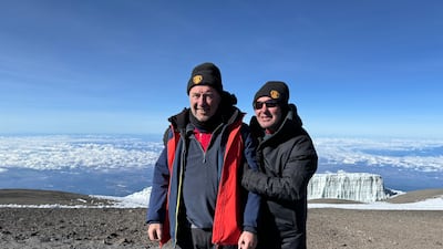 Former United and England captain Bryan Robson, right, was part of the group