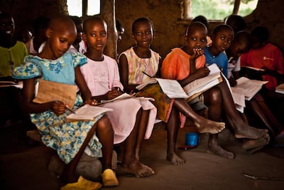 Students take exams at the Lukumbe Chanche school in Uganda. Courtesy Save the Children