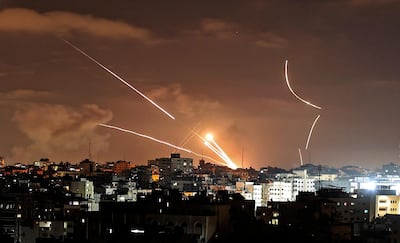 Rockets launched from Gaza City streak towards Israel on May 12. AFP