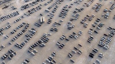 Dubai Police’s impound yard in Al Qusais. A committee will sell the vehicles at a public auction. Reem Mohammed / The National