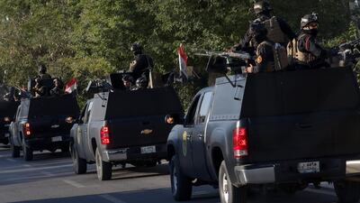 Iraqi security forces patrol in Baghdad during a visit by Pope Francis to Iraq in early March 2021. AP Photo