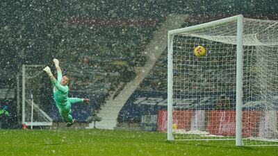 West Bromwich Albion goalkeeper Sam Johnstone cannot stop Arsenal's Kieran Tierney opening the scoring during his team's 4-0 Premier League defeat at a snowy Hawthorns on Saturday, January 3. Reuters
