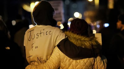 A protester with 'Justice for Tyre Nichols' written in pen on their T-shirt. Reuters