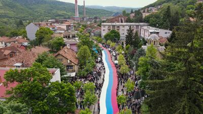 People carry a giant Serbian flag during a protest in the town of Zvecan in northern Kosovo. AP Photo