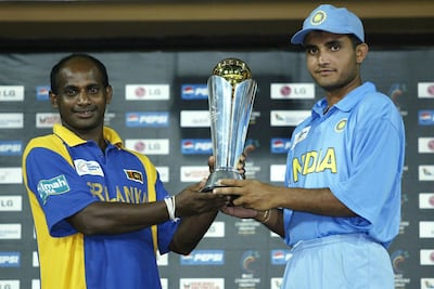 Sanath Jayasuriya of Sri Lanka and Sourav Ganguly of India with the ICC Champions Trophy after the final between the teams was washed out at the R. Premadasa Stadium in Colombo on September 30, 2002. India and Sri Lanka were declared joint winners. Getty Images