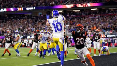 Los Angeles Rams wide receiver Cooper Kupp (10) catches a touchdown against Cincinnati Bengals cornerback Eli Apple. AP