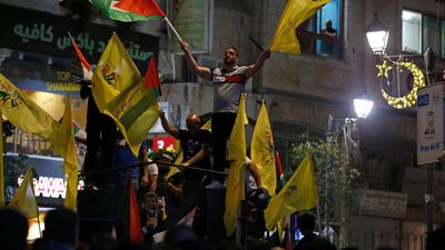 Fatah supporters demonstrate in the West Bank city of Ramallah in solidarity with Palestinian families facing Israeli eviction orders in the Sheikh Jarrah neighbourhood of East Jerusalem. AFP