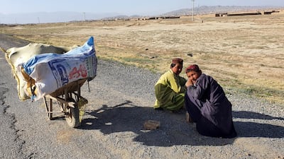 Afghan refugees pose for a photograph at their refugee camp on the eve of World Refugees Days, in Pishin, Balochistan province, Pakistan. Pakistan hosts more than 1.5 million Afghan refugees and has repatriated more than one hundred thousand refugees back to their country in the last two years. World Refugee Day is marked annually on 20 June. According to the UNHCR, more and more refugees today live in urban settings outside refugee camps. EPA