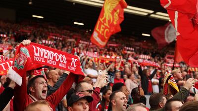 Liverpool fans cheer on the team from the Anfield stands.Getty Images
