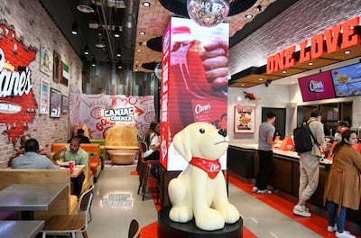 The restaurant is named after the founder's Labrador, Raising Cane I. Khushnum Bhandari / The National