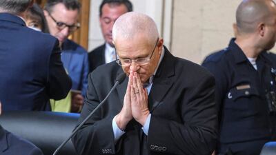 Los Angeles City Council member Mike Bonin pauses while speaking to his supporters before starting the meeting on Tuesday. AP