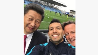 The now-famous selfie of Manchester City's star Argentine striker Sergio Aguero with Chinese president Xi Jinping and British prime minister David Cameron. Courtesy Manchester City Football Club