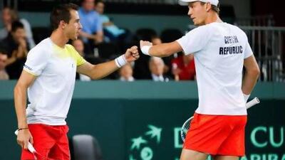 Tomas Berdych, right, and Lukas Rosol took a tournament record seven hours to beat their Swiss opponents. Valentin Flauraud / Reuters