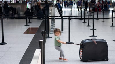 Expat families face high autumn travel costs from the Emirates to the UK in particular. EPA