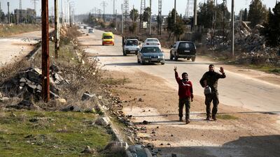 People walk as Syrian army units advance to the Aleppo Ghazi Aintab International Highway and the northern countryside of Aleppo, Syria. EPA