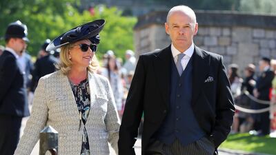 Former England rubby coach Clive Woodward and Jayne Williams arrive for the wedding ceremony of Britain's Prince Harry and Meghan Markle at St George's Chapel, Windsor Castle, in Windsor. Gareth Fuller / AFP