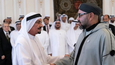 Sheikh Humaid bin Rashid, Ruler of Ajman, greets King Mohammed VI. Rashed Al Mansoori / Crown Prince Court - Abu Dhabi