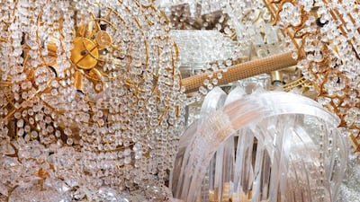 An installation from an exhibition at Riyadh's Red Palace using old chandeliers. Image courtesy of Athr and the artist