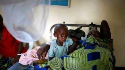 Thomas Medishimiye, 2, with his mother at Rutshuru hospital. Most of the newly injured in Congo's latest eastern rebellion are, for the first time, civilians, and the majority are women and children.