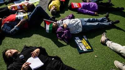 Protesters stage a 'die-in' during a rally against US President Donald Trump's policies and the Asia-Pacific Economic Co-operation (Apec) Summit in Gyeongju, South Korea. AFP