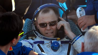 US astronaut Nick Hague calls his relatives. AP Photo