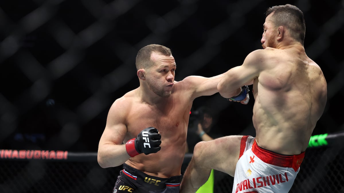 Petr Yan punches Merab Dvalishvili at UFC 333