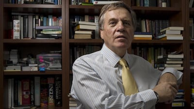 Author Andrew Palmer at his home in Jumeirah. His book is titled The New Pirates, Modern Global Piracy From Somalia To The Southern China Sea. Antonie Robertson/The National