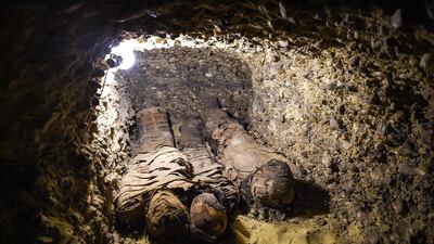Newly-discovered mummies wrapped in linen found in burial chambers at the necropolis of Tuna el-Gebel, Egypt. AFP
